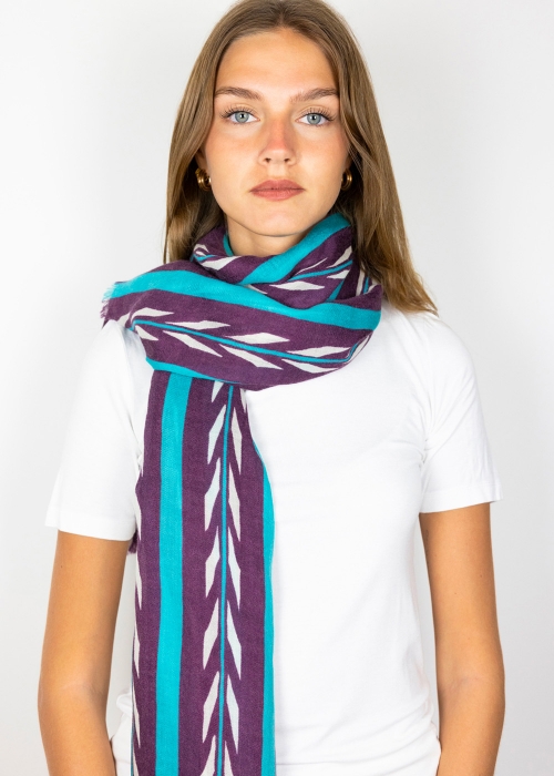Model wearing plum cashmere shawl