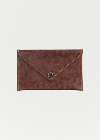 Small leather card holder in ruggine